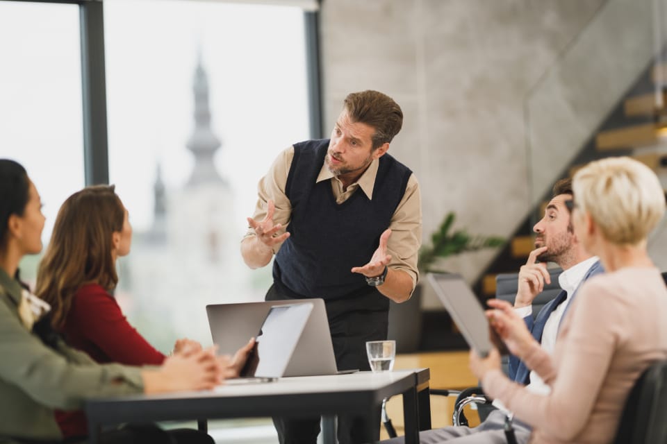 A team planning together around a table